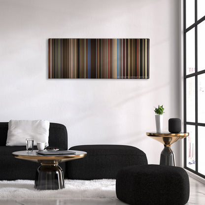 Rocketman color palette canvas above a black sofa with a gold-topped table