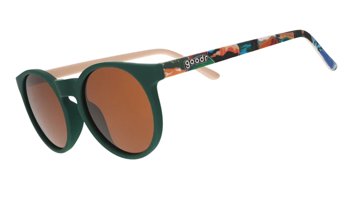 Goodr Scenic Route Trailblazer sunglasses with green round frames, brown lenses, and multicolor arms