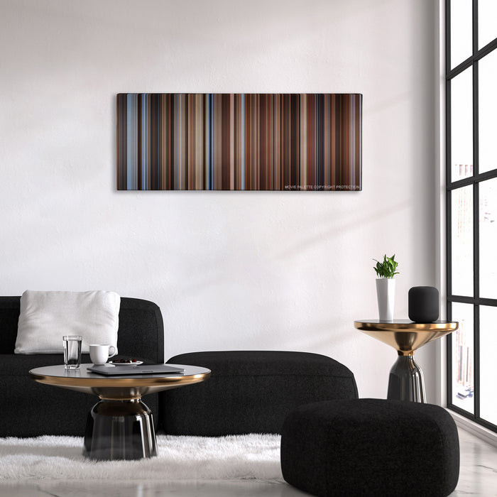 Seven Years in Tibet color palette canvas above a black sofa with a gold-topped table