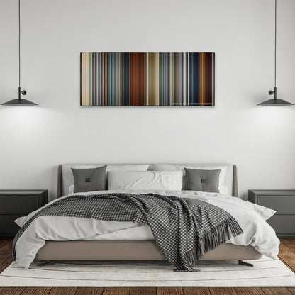 Skyfall color palette canvas above a bed, between two black pendant lamps