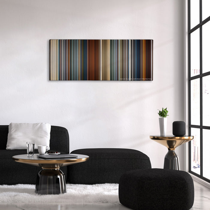 Skyfall color palette canvas above a black sofa with a gold-topped table
