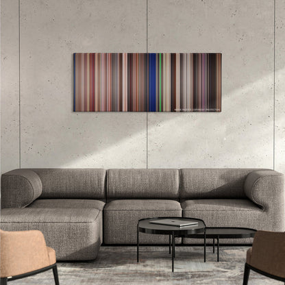 Starship Troopers color palette canvas on a concrete wall above a gray sectional sofa