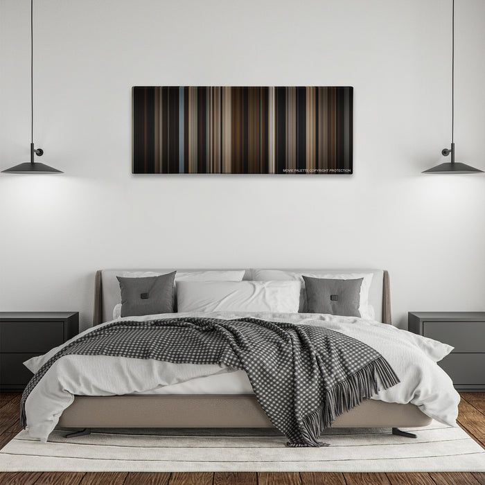 The Big Sick color palette canvas above a bed, between two black pendant lamps