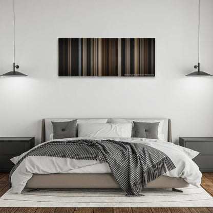 The Big Sick color palette canvas above a bed, between two black pendant lamps