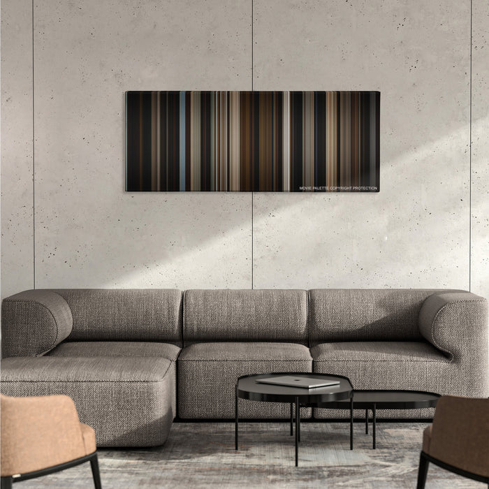 The Big Sick color palette canvas on a concrete wall above a gray sectional sofa