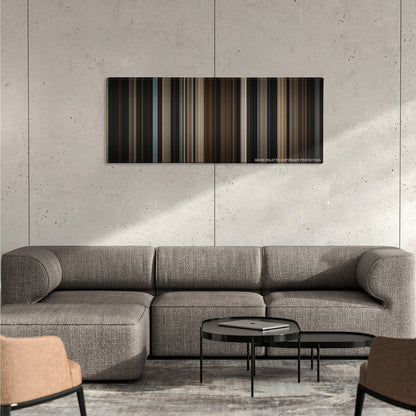 The Big Sick color palette canvas on a concrete wall above a gray sectional sofa