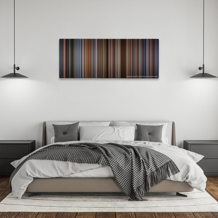 The Family Man color palette canvas above a bed, between two black pendant lamps