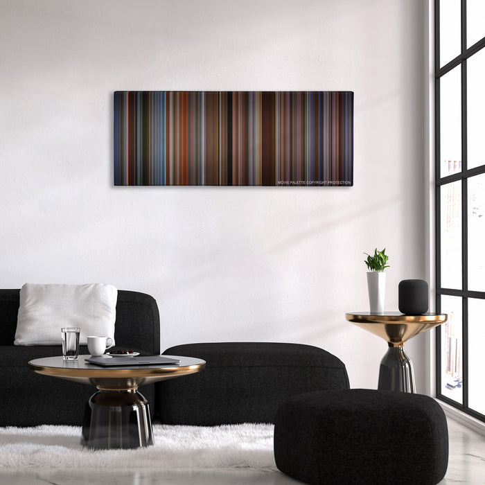 The Family Man color palette canvas above a black sofa with a gold-topped table