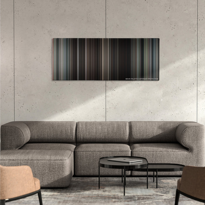 The Great Escape color palette canvas on a concrete wall above a gray sectional sofa