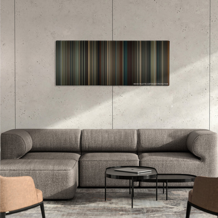 The Imitation Game color palette canvas on a concrete wall above a gray sectional sofa