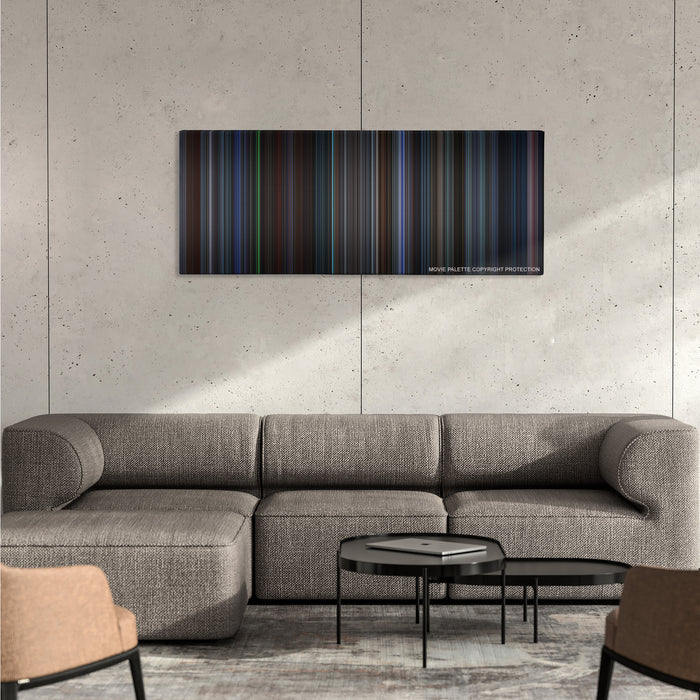 The Recruit color palette canvas on a concrete wall above a gray sectional sofa
