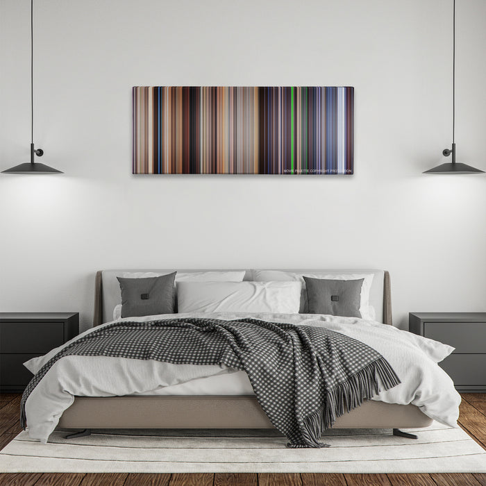 The Truman Show color palette canvas above a bed, between two black pendant lamps