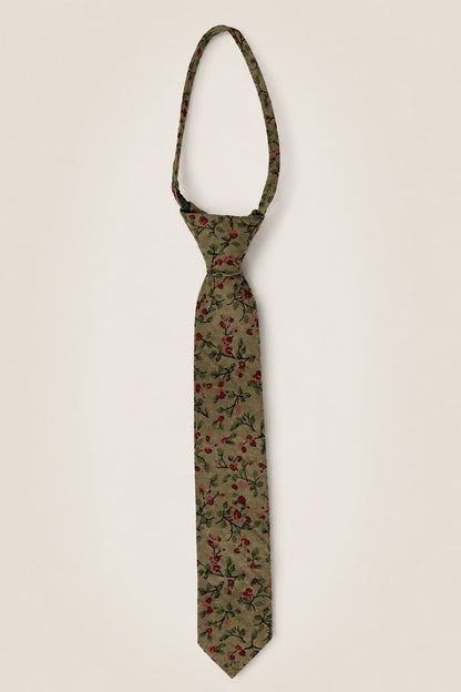 Ivy City Co's Ties in Woodland Floral features an olive green base adorned with a striking red and black floral motif, meticulously crafted from soft cotton—making it the perfect wedding accessory, showcased here against a simple light backdrop.