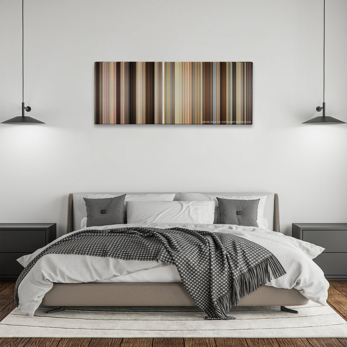Trainwreck color palette canvas above a bed, between two black pendant lamps