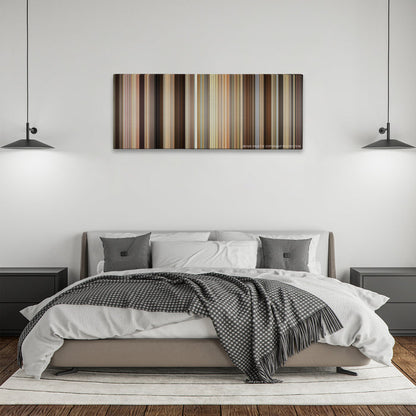 Trainwreck color palette canvas above a bed, between two black pendant lamps