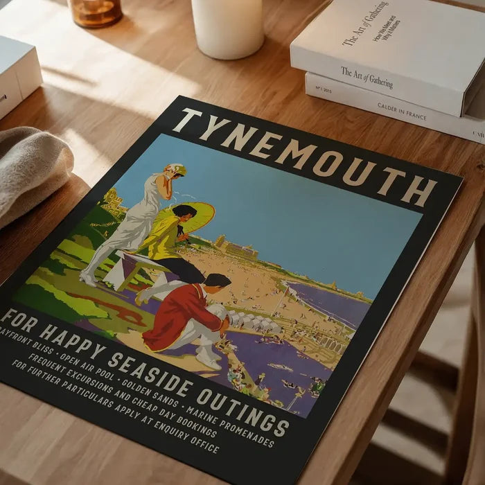 Vintage Railway Style Tynemouth Tourist Poster Print unframed on a home office desk