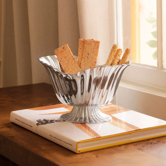 Beatriz Ball Vintage Vienna Medium Grissini Pedestal — Holding breadsticks beside a window