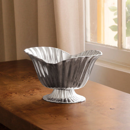 Beatriz Ball Vintage Vienna Medium Grissini Pedestal — Empty pedestal dish beside a window
