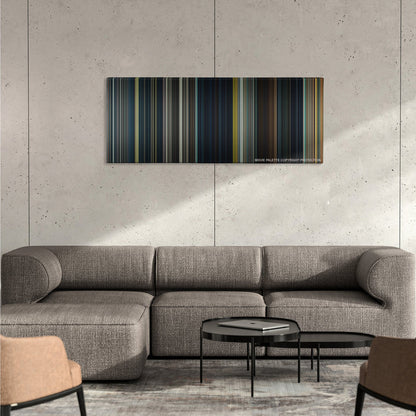 Warm Bodies color palette canvas on a concrete wall above a gray sectional sofa