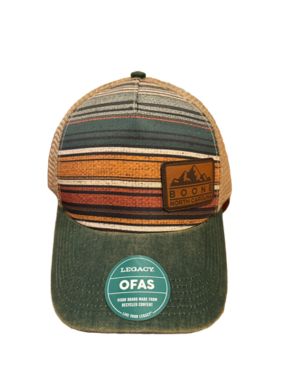 Waypoint Boone trucker hat with green brim and earth-tone woven front