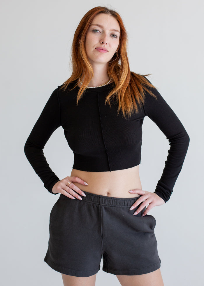 Side view of Women's Inside Out Long Sleeve in black on model