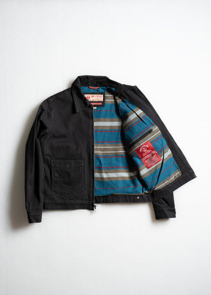 Black jacket with open front reveals striped blue, brown lining. Features a chest pocket and visible red label inside.
