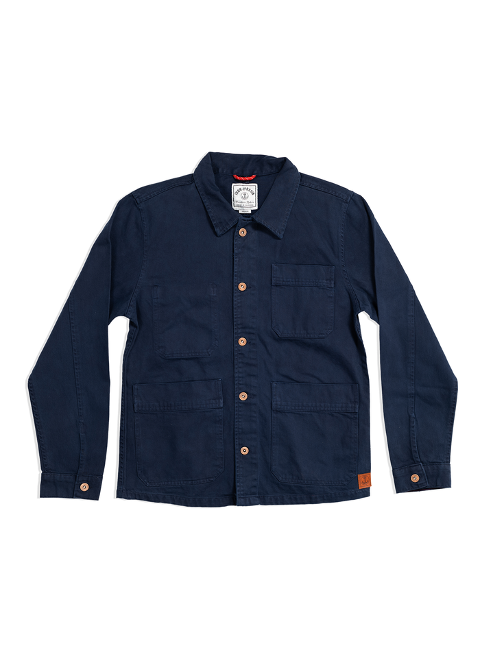 Navy blue chore jacket with four pockets and brown buttons, laid flat on a white background, showcasing its classic design.