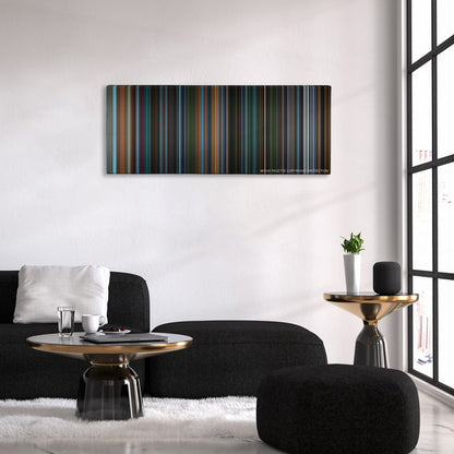 X2: X-Men United color palette canvas above a black sofa with a gold-topped table